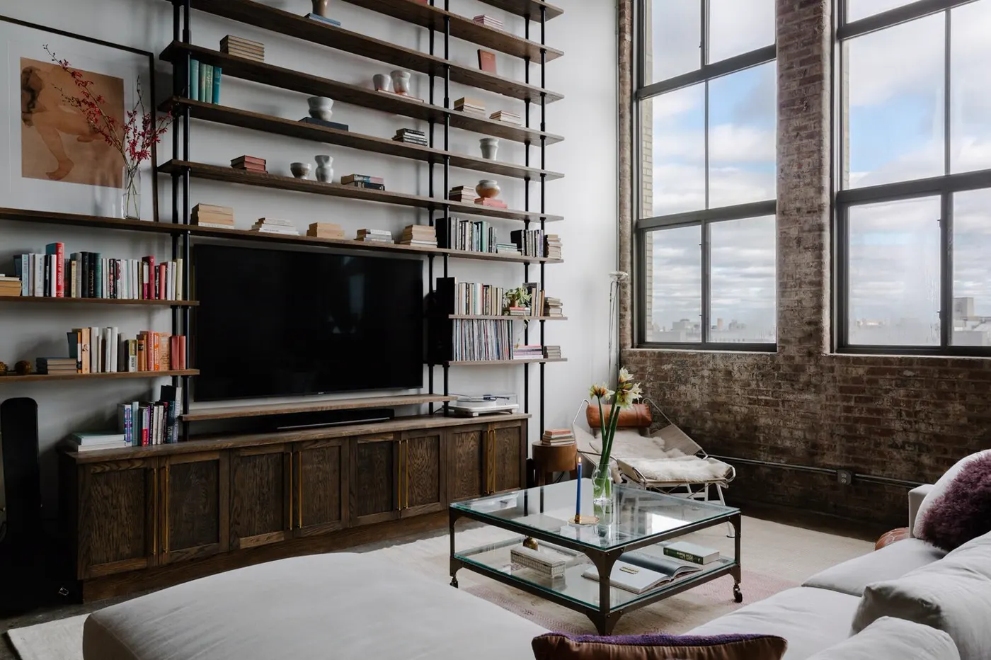 Renovated living room in a Williamsburg, Brooklyn loft by MELDNYC